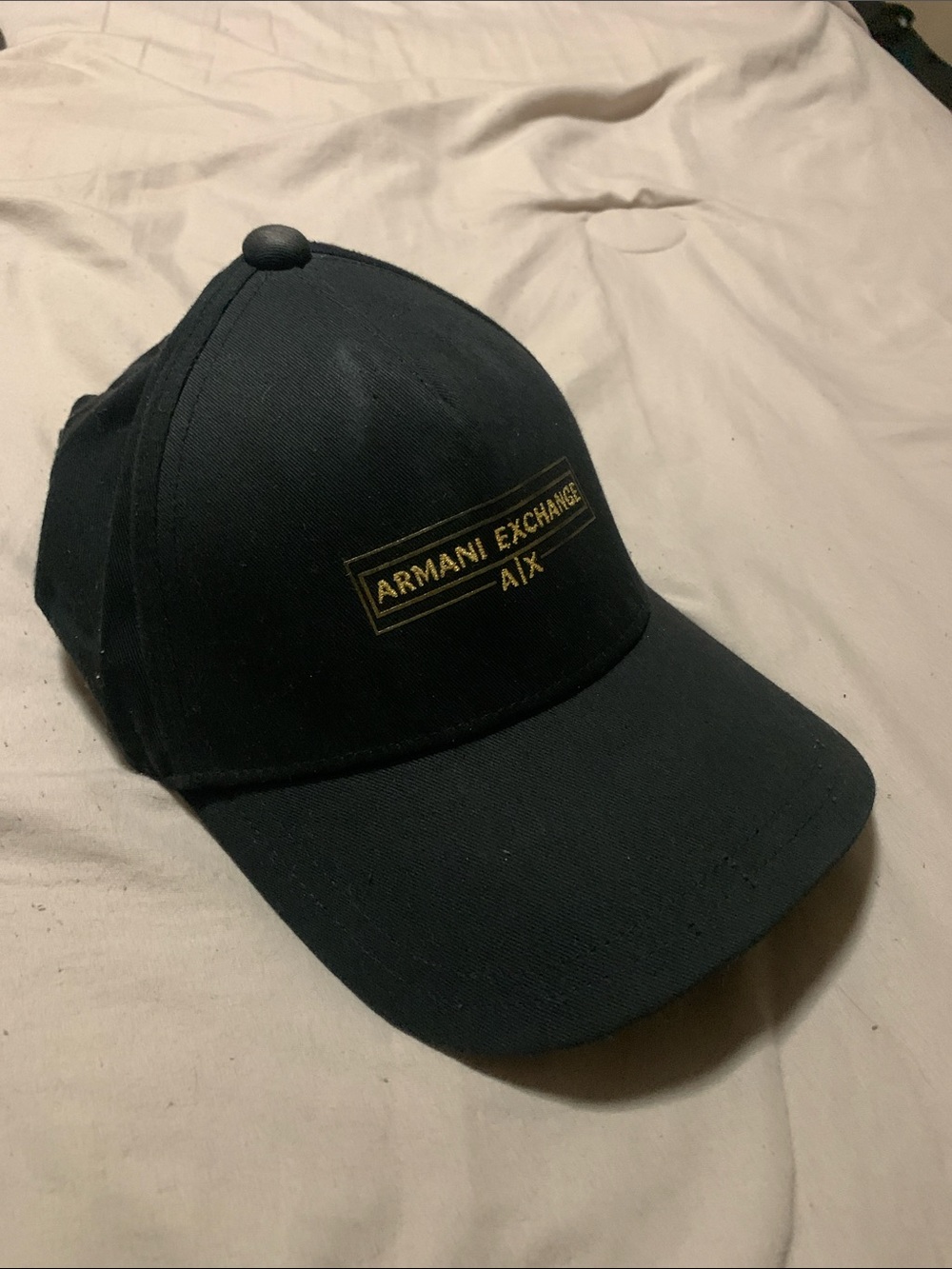 Armani Exchange Black Cap with Gold Logo Patch